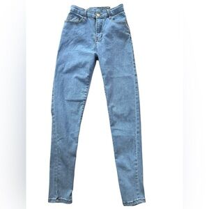 Women’s high waisted skinny denim jeans that laces in the back. EUC Size Medium